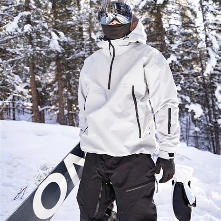 Can I wear a snowboard jacket for skiing?