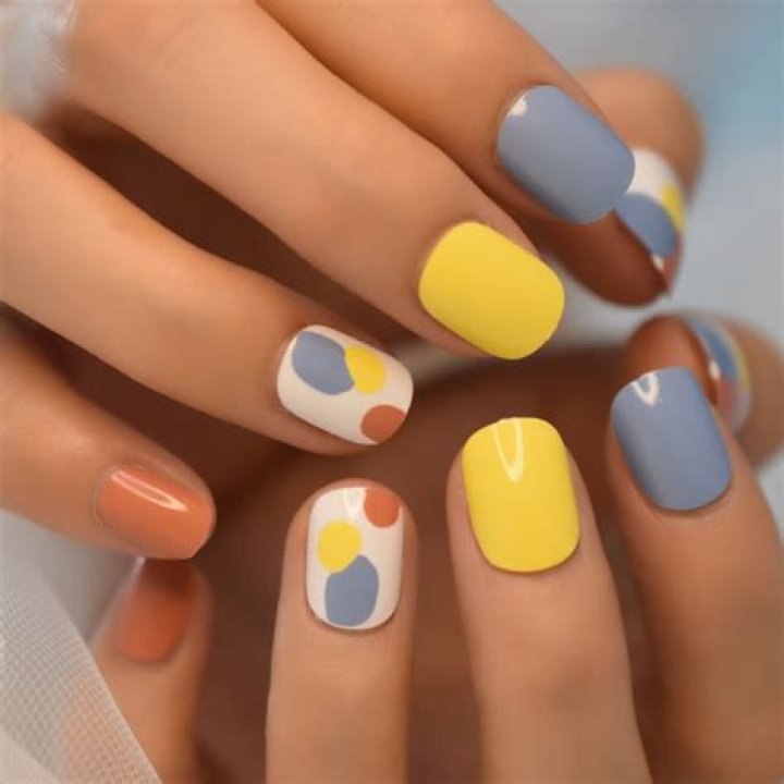 Can you wear false nails in catering?