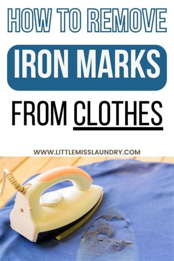 How do you remove shiny iron marks from black clothes?