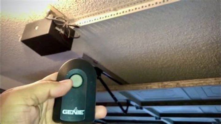 How do you replace a old garage door opener remote?
