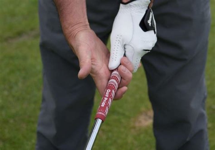 How far can you grip down on a putter?