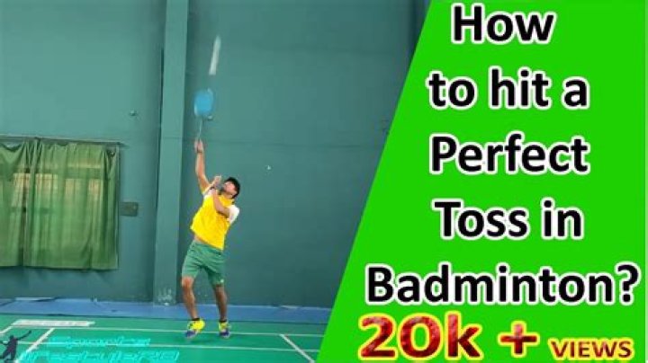 How is toss done in badminton?