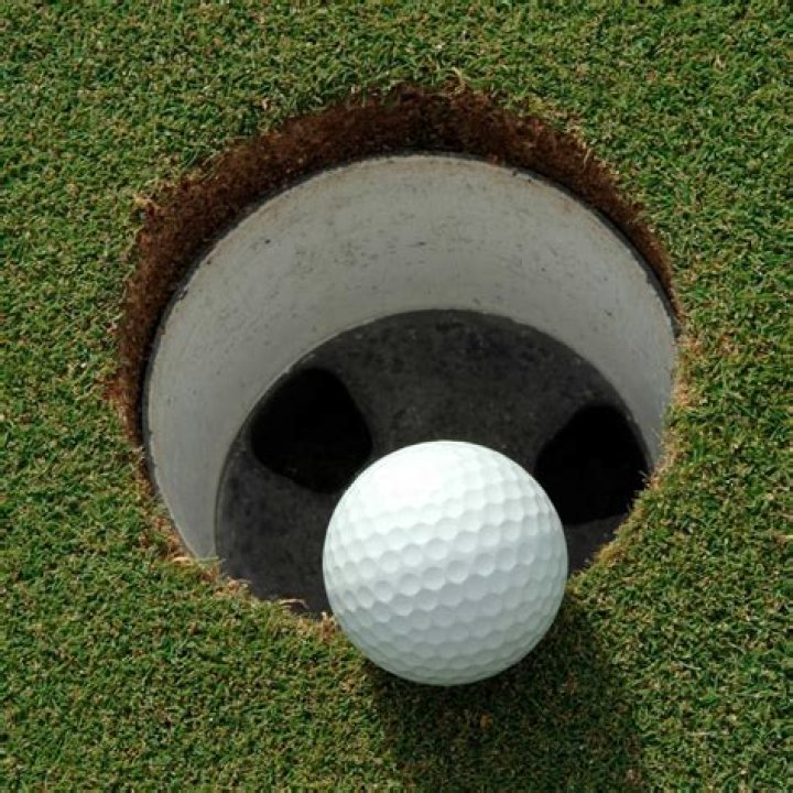 How many holes makes up a regulation golf tournament?