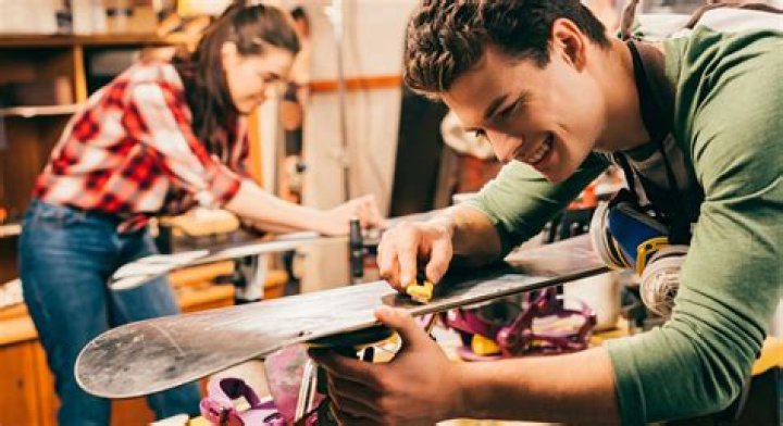 How often should skis be serviced?