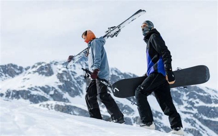 Is it harder to do tricks on skis or snowboard?