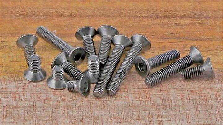 What are flat headed screws called?