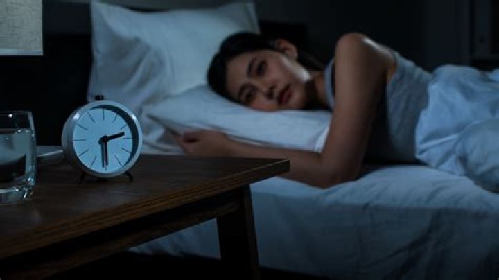 What causes a woman not to sleep at night?