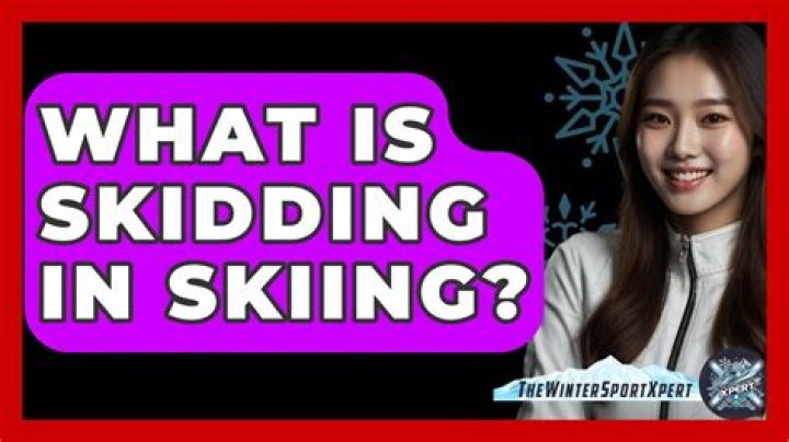 What is skidding in skiing?