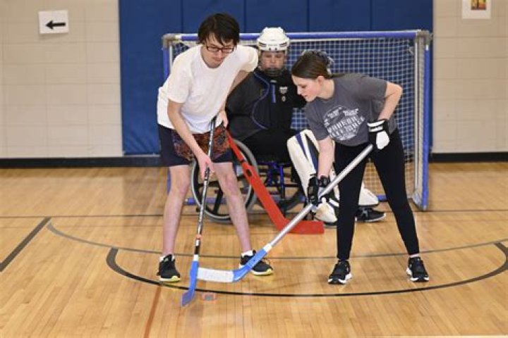 What sport was floor hockey adapted from?