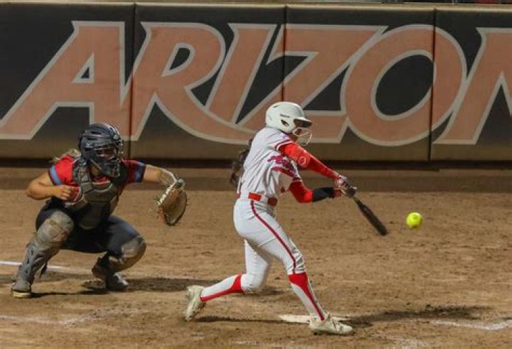 Who is Arizona softball coach?
