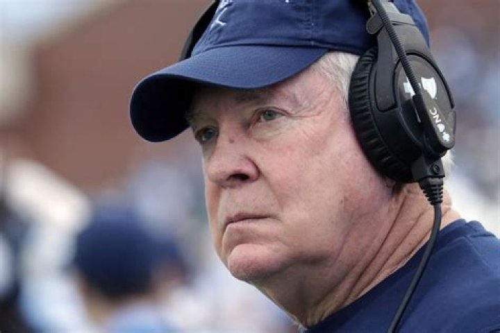 Who is the oldest college football coach 2021?