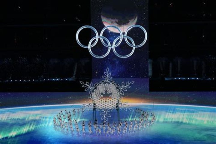 Who shattered their spine in the Olympics?