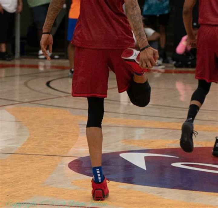 Why do basketball players wipe the bottom of their shoes?