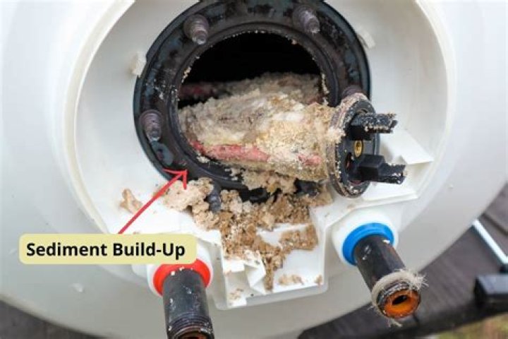 Why is there sediment in my water tank?