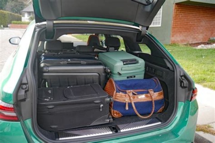 Will skis fit in a full size car?